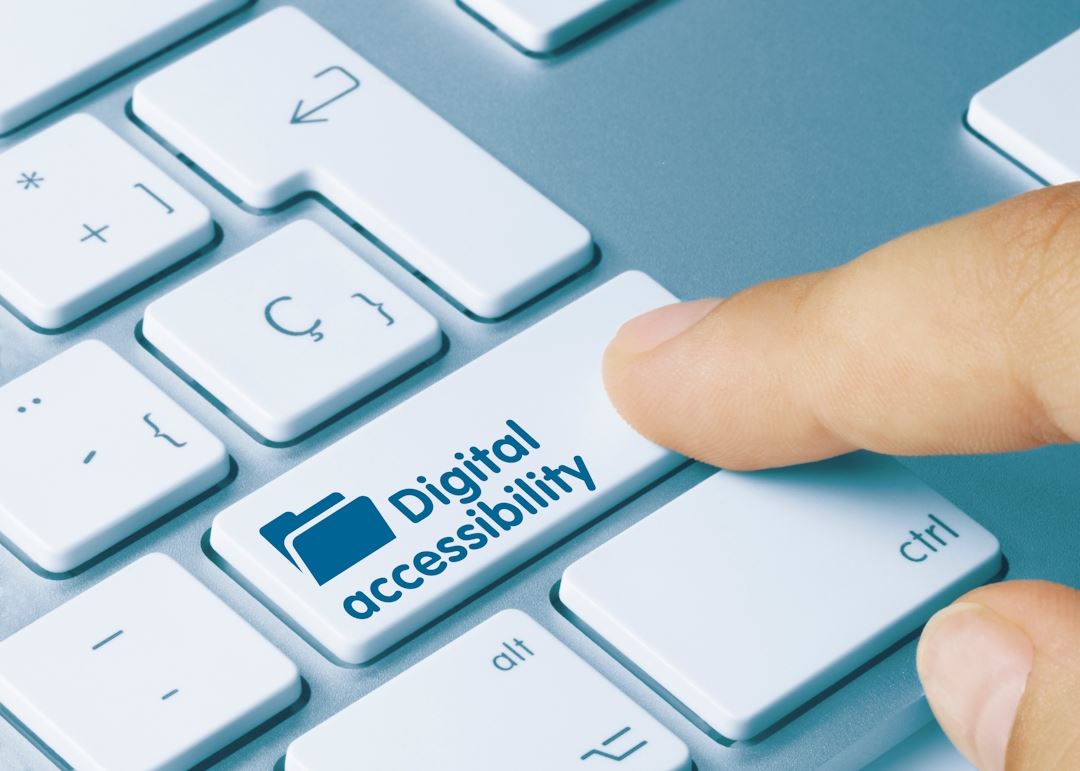  cut out of a keyboard with a finger on a key labeled digital accessigility
